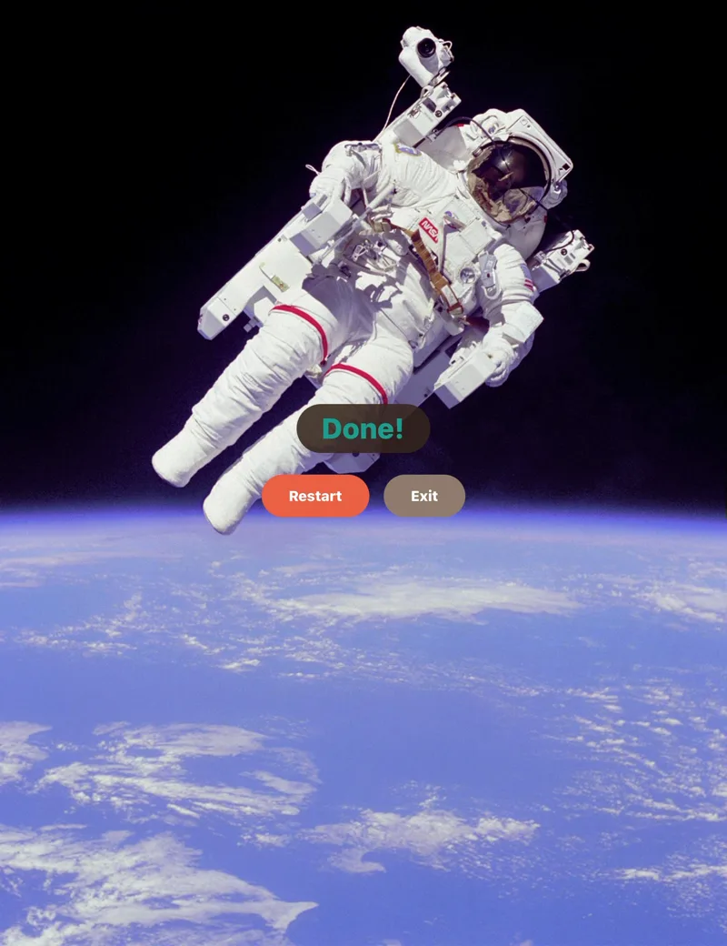 The finished timer on an iPad: the astronaut photograph fully revealed, with a Done! banner and Restart and Exit buttons.