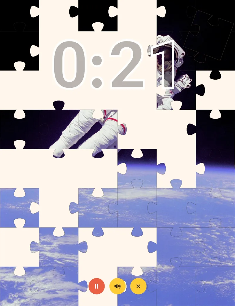 The same timer on an iPad with twenty-one seconds left, uncovering a photograph of an astronaut spacewalking above Earth.